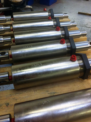 manufactured cylinders on pallet ready to ship